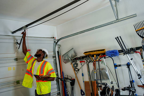 Professional Garage Door Spring Repair technician working in Sheffield Lake, OH